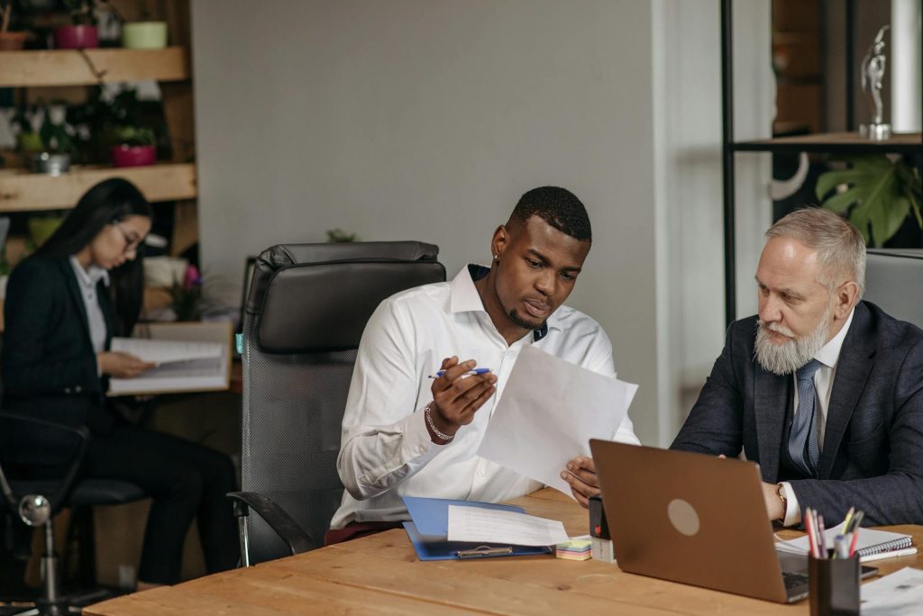 Letting agency director in serious meeting with solicitor and landlord client